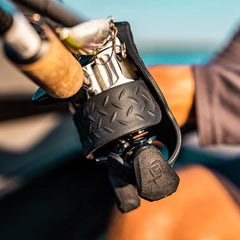 13 FISHING Skull Cap reel guard - durable rubber fits most baitcast reels, preventing grime during use.