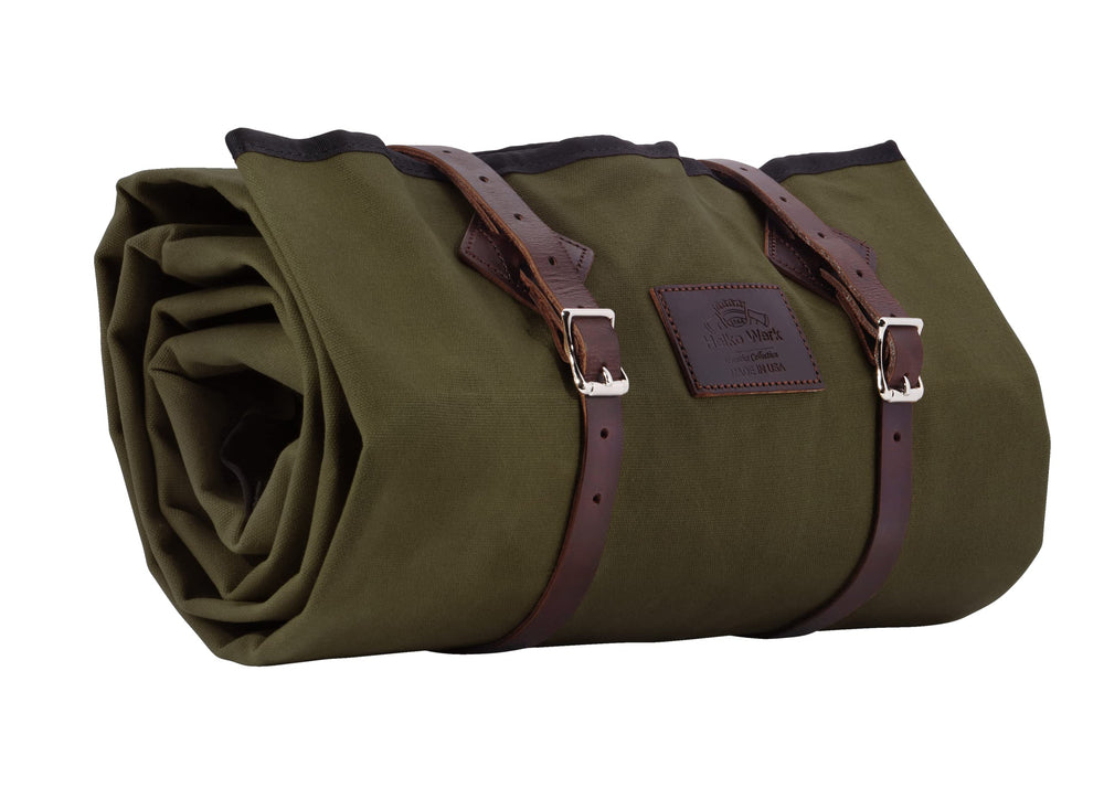 1844 Helko Werk Cowboy Bedroll forest green rolled for fast campsite setup.