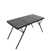 23ZERO Two-Fold camping table, closed side view with carry handle for portable setup.