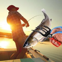 Close-up of the 3-claw clamp gripping a fish