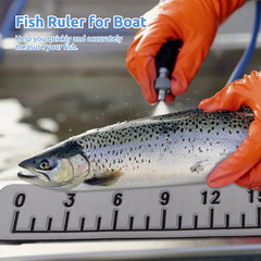 Measuring a fish up to 36 inches using the EVA foam ruler on a boat
