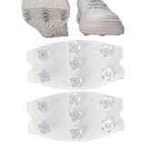 7-Spike Ice Cleats on boots provide secure traction on icy sidewalks.