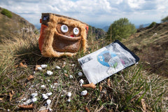 Hand applying 8BPLUS crushed chalk demonstrates quick-drying grip for climbs.