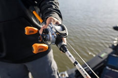 Abu Garcia Max STX low profile reel side view showing 5+1 bearings and lightweight graphite body.