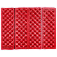 AceCamp Polyester 3940 folding mat folded for compact carry and easy storage.
