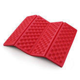 AceCamp Polyester 3940 folding mat in open state provides portable comfort on uneven ground.