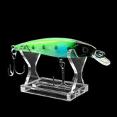 Clear acrylic display stand showcasing a large fishing lure.