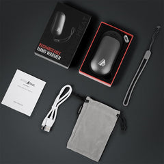 ActionHeat 5V hand warmer held in hand with ergonomic grip.