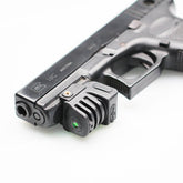 Ade Advanced Optics LSL8G-1 green laser sight mounted on a rail for fast targeting.