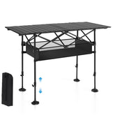 ALPHA CAMP folding table adjustable-height design on uneven ground for stability