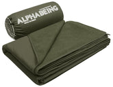 AlphaBeing waterproof outdoor blanket in olive folded for compact carry and storage