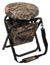 ALPS OutdoorZ Horizon swivel-stool shown in Mossy Oak Shadow Grass Habitat with 360-degree rotation for field viewing