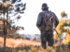 ALPS OutdoorZ Pursuit Pack lashing system stabilizes gear on uneven terrain.