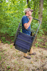 ALPS Mountaineering rocking chair folded for storage demonstrates compact portable outdoor seating