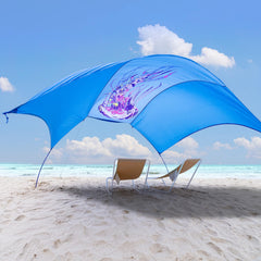 ALYCASO Beach Wind Shade Canopy on the beach providing cooling shade for family.