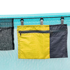 Amagogo Hammock Organizer Bag yellow rolled up for compact portability