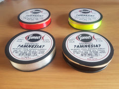 Amnesia Sunset Black memory-free monofilament for sea fishing, reducing tangles and easing knot tying.