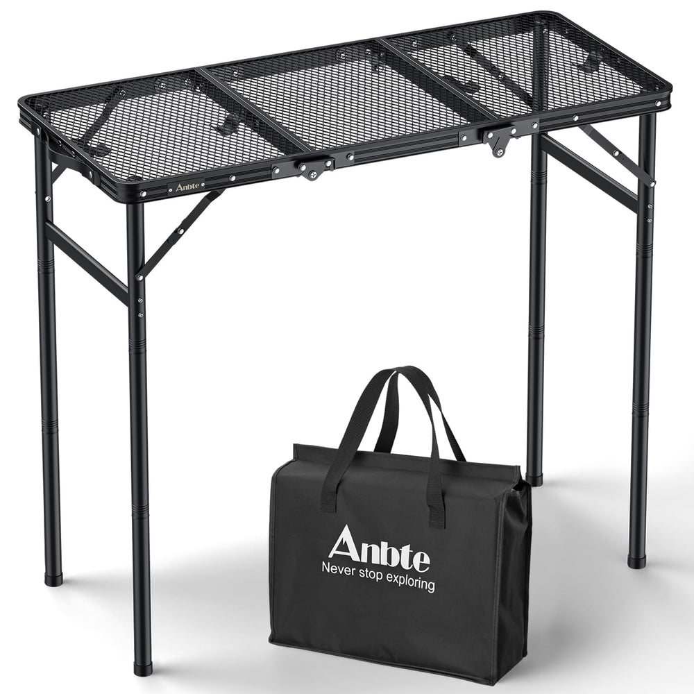 Anbte grill table folded into a compact briefcase, ideal for travel.