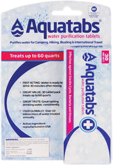 Aquatabs 49mg tablet dissolving in water for camping hydration