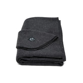 Arcturus Military Wool Blanket charcoal folded, compact warmth for travel.