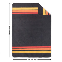 Arcturus Rainier blanket on queen bed demonstrates full coverage and coziness