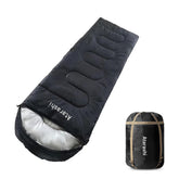 Atarashi camping sleeping bag XL packed in compression sack, ideal for light, organized backpacking.