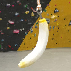 Atomik Rock Climbing included stainless bolts closeup emphasizes quick, secure installation.