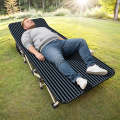 ATORPOK oversized camping cot fully set up for outdoor sleep comfort.