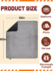 Aulock blanket waterproof outer layer protecting from damp bleachers and grass.