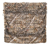 AUSCAMOTEK camo netting laid for ground blind setup with leaf pattern for concealment.