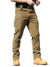 AUTIWITUA men's tactical cargo pants fabric closeup shows lightweight, durable material for hiking.