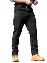 AUTIWITUA men's tactical cargo pants with water-repellent fabric for outdoor protection.
