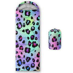 Axolotl leopard print sleeping bag for kids opened to form a cozy blanket for picnics.