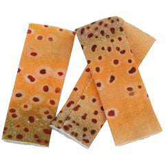Close-up of finger protector with yellow fish skin design