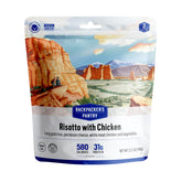 Backpacker's Pantry Risotto with Chicken pouch shows creamy parmesan and veggies for an easy camping dinner.