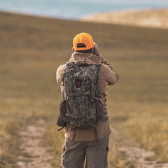 Badlands ATX16 pack side view highlights lightweight, durable construction for all-terrain treks.