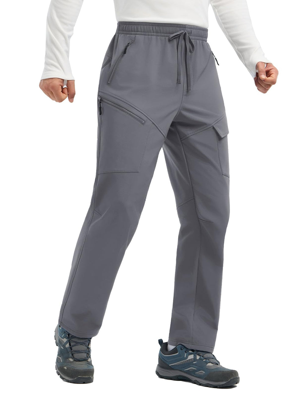 Baleaf men's softshell pants with waterproof DWR finish for light rain hikes.