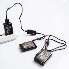 BARCHI HEAT USB cable connected to a power bank for on-the-go charging.