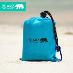 BEARZ Outdoor pocket blanket with stake loops for secure outdoor setup