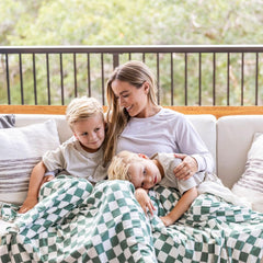 Beddy's travel blanket spread on a car seat for road-trip warmth and full coverage