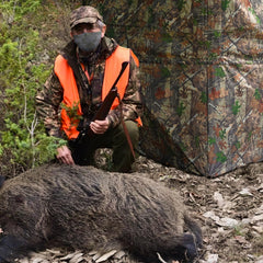 Beviliu ground blind interior accommodates 2–3 hunters and gear.