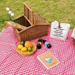 Beyond Thursday picnic blanket folded into its compact carrier for easy transport.