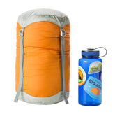 Big Agnes compression sack Tangelo 15L, top view showing space-saving packing potential.