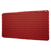 Big Agnes Rapide SL insulated sleeping pad in pack shows compact warmth for three-season trips.
