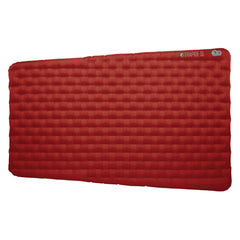 Big Agnes Rapide SL insulated sleeping pad in pack shows compact warmth for three-season trips.