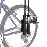 Fishing rod holder attached to bicycle back fork holding two rods