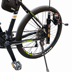 Black bike fishing rod holder mounted on bicycle rear fork