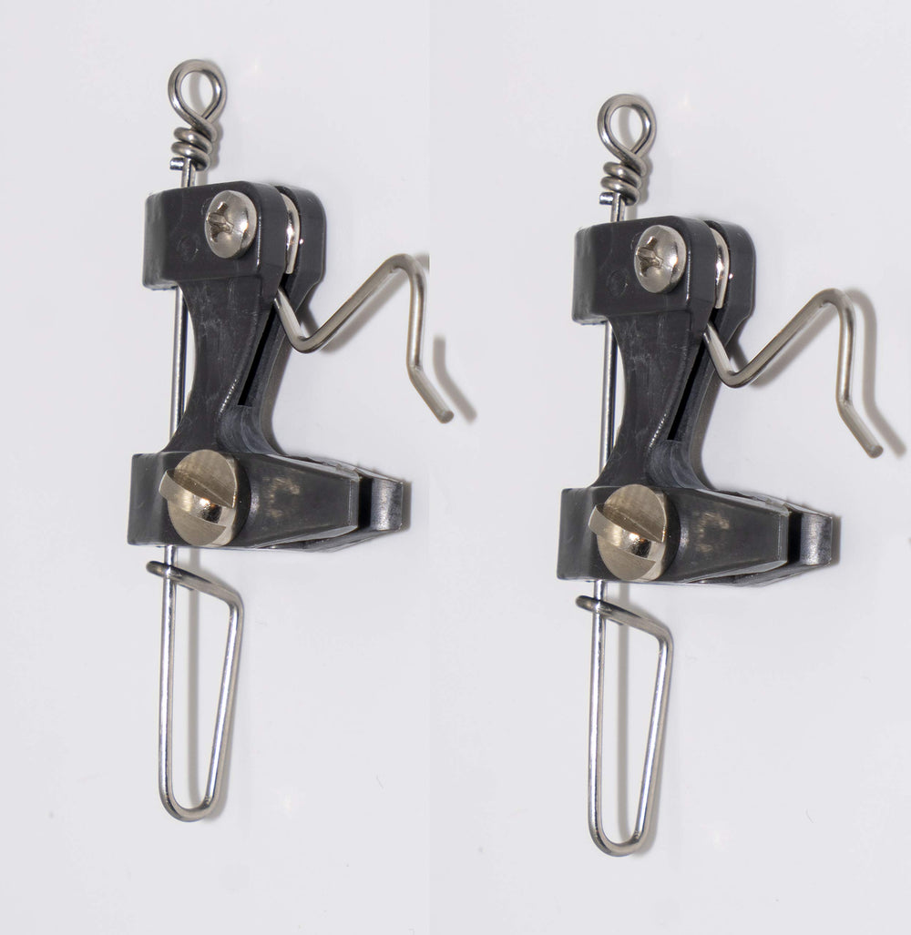 Close-up of DOWNRIGGER Release Clips showing adjustable tension for outriggers