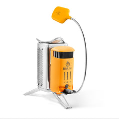 BioLite CampStove 2+ on wood fire cooking for portable meals outdoors.