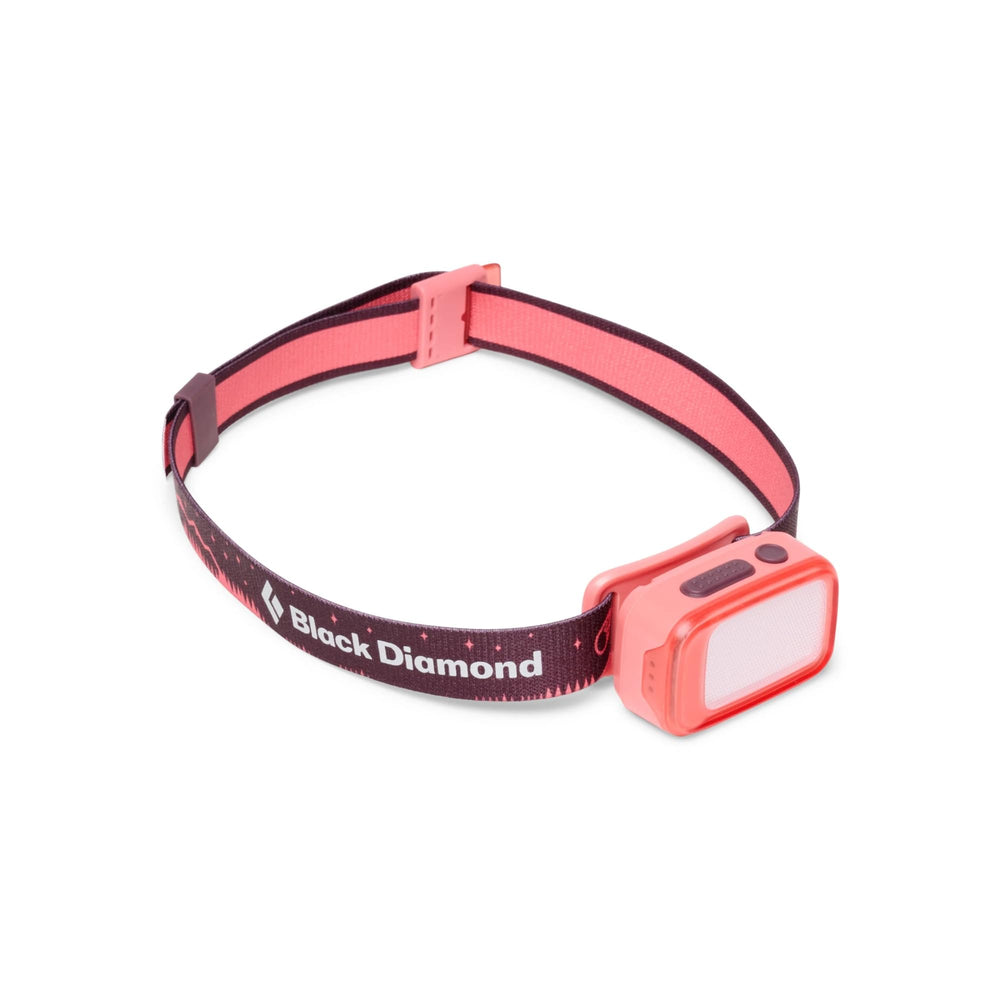 BLACK DIAMOND Wiz Kid headlamp worn by a child for hands-free camping and reading